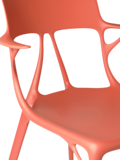 كرسي من تصميم الذكاء الاصطناعي بلون برتقالي