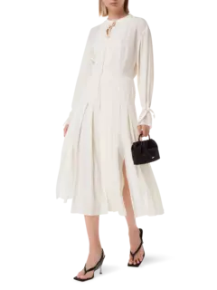 فستان حفلات من الحرير بأكمام طويلة وكسرات