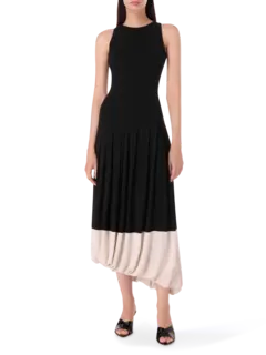 فستان متوسط الطول بدون أكمام وتفصيل حافة