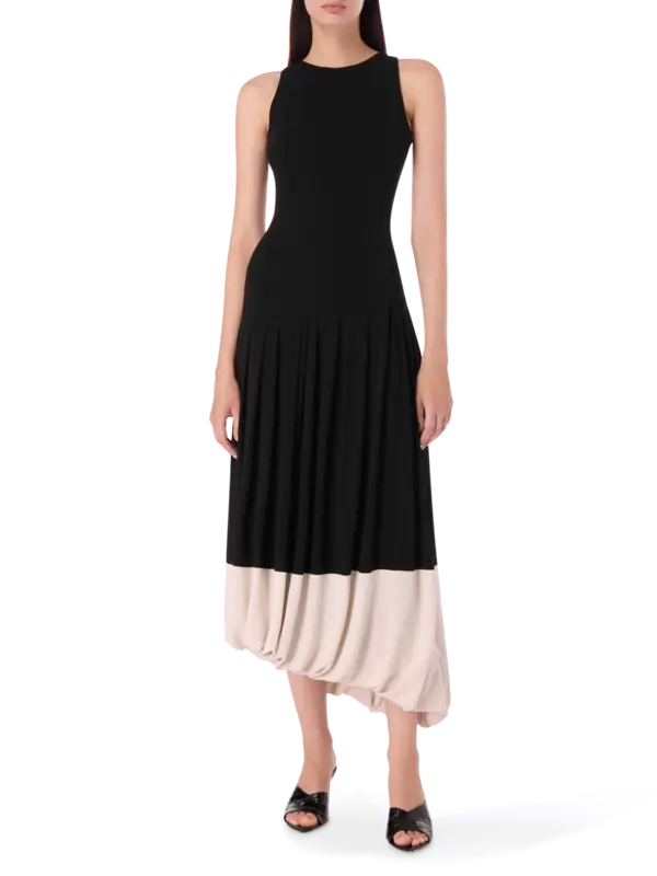 فستان متوسط الطول بدون أكمام وتفصيل حافة