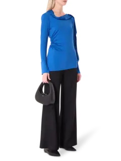 بلوزة من قماش الجيرسيه بأكمام طويلة وتصميم منسدل