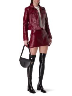 تنورة قصيرة من الفينيل بفتحات مزدوجة