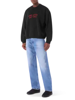 سويت شيرت تياجو ألكسندر × إم إس جي إم مزين بعبارة "Every Smile You Fake"