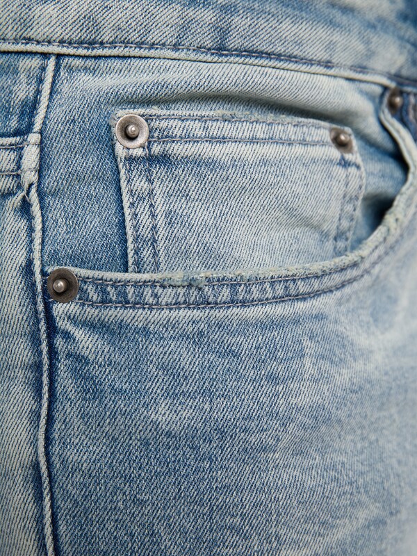 Light wash blue denim jeans
