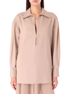 بلوزة بأكمام طويلة من الصوف مزينة بطبعات استوائية