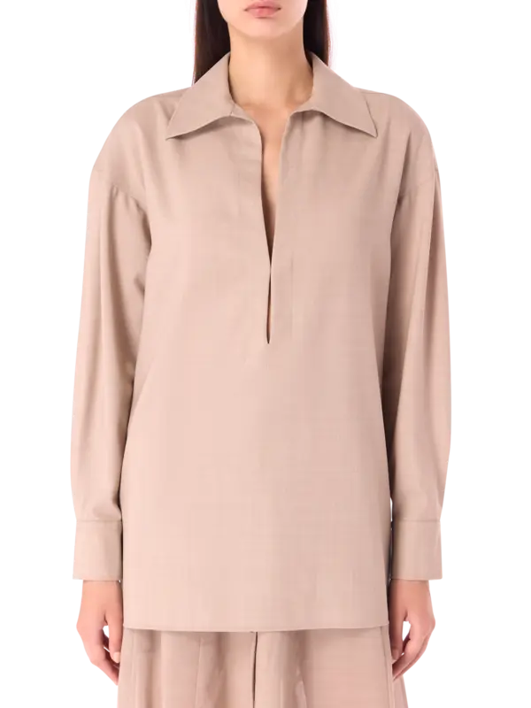 بلوزة بأكمام طويلة من الصوف مزينة بطبعات استوائية