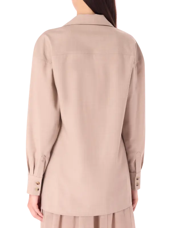 بلوزة بأكمام طويلة من الصوف مزينة بطبعات استوائية