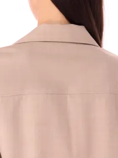 بلوزة بأكمام طويلة من الصوف مزينة بطبعات استوائية