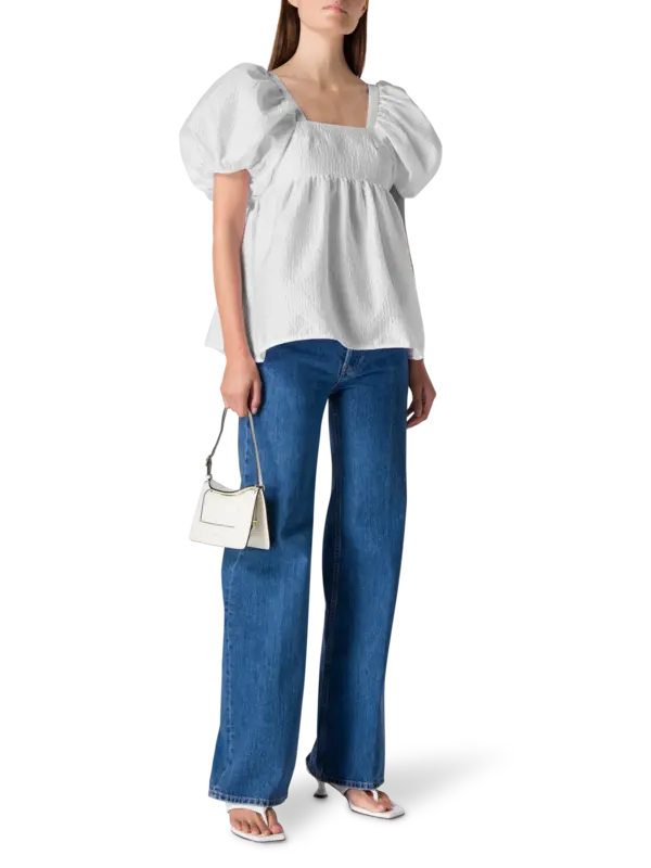 بلوزة ألما ستريا بأكمام منفوخة مزينة بنقوش بارزة