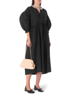 فستان جينزا متوسط الطول