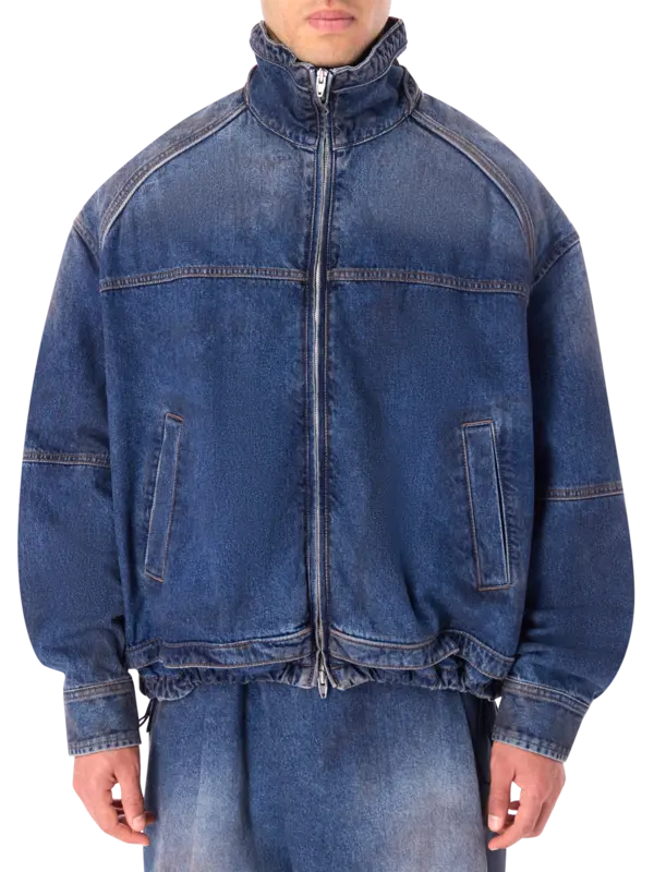 قميص بسحاب من الجينز المغسول بالزيت