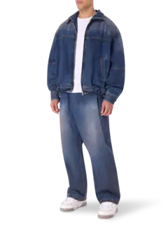 قميص بسحاب من الجينز المغسول بالزيت