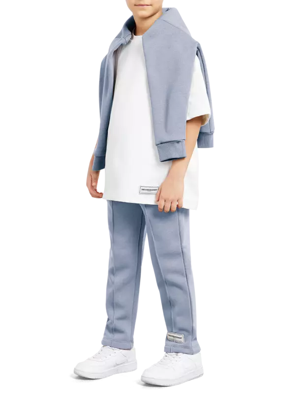 بنطال رياضي خفيف للركض للأطفال بقصة واسعة من الأعلى تضيق على الكاحل