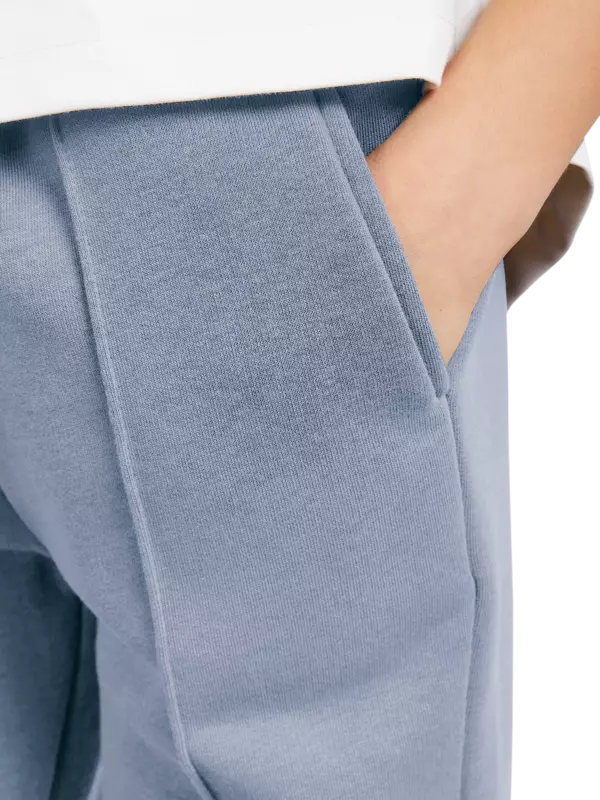 بنطال رياضي خفيف للركض للأطفال بقصة واسعة من الأعلى تضيق على الكاحل