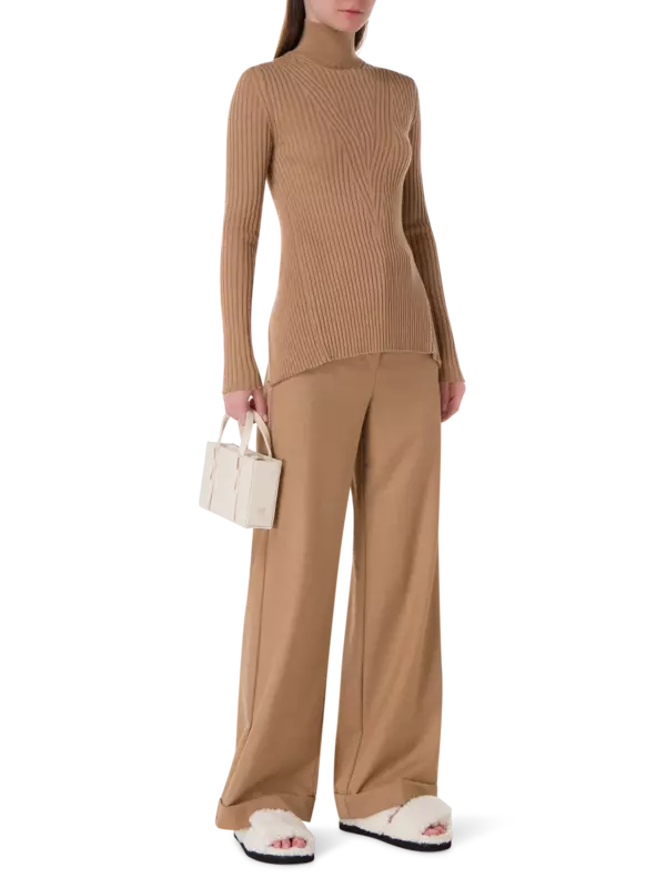 سترة محبوكة مضلعة بأكمام طويلة وظهر مفتوح