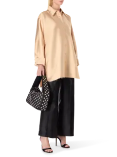 قميص كبير الحجم بأكمام طويلة