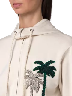 هودي بسحاب مزين بتطريز شجرة نخيل