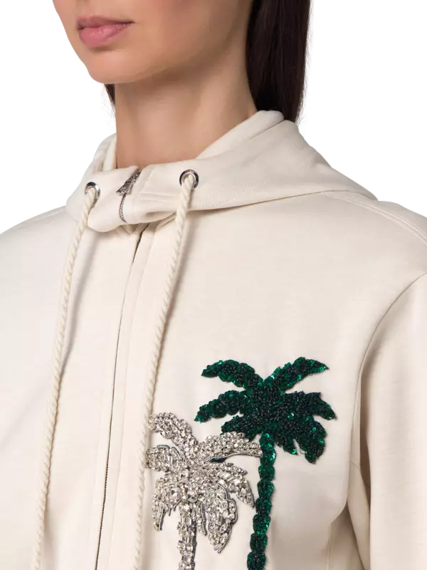 هودي بسحاب مزين بتطريز شجرة نخيل