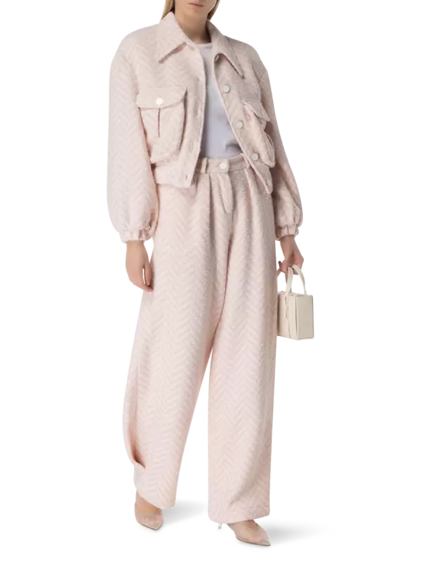 بنطال بقصة كبيرة الحجم وبخصر منخفض من الصوف الخشن بنقشة هيرينجبون