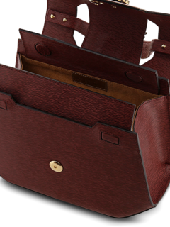 Structured Handbag with Cutout Flap and Statement Eagle Embellishment