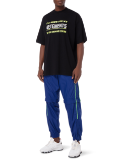 تيشيرت مطبوع عليه عبارة "Show Me Your Vetements"