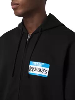 هودي بسحاب مطبوع بعبارة "My Name Is Vetements"