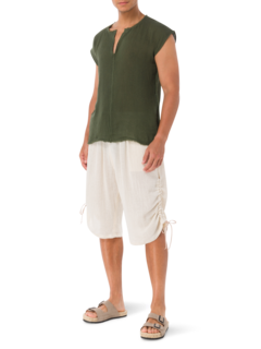 قميص زول خفيف بدون أكمام وبرقبة على شكل حرف V